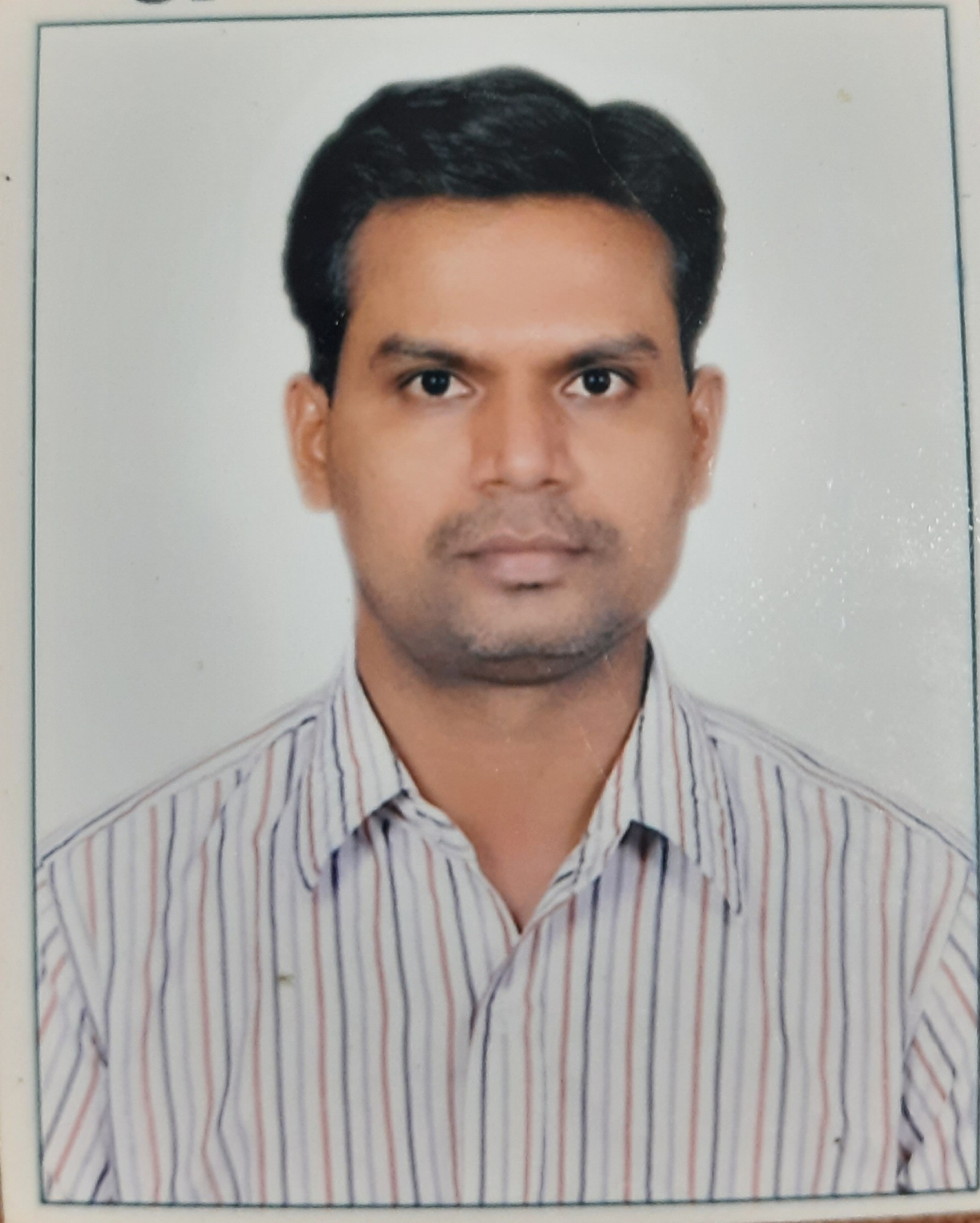 DR. RAGHAVENDRA B